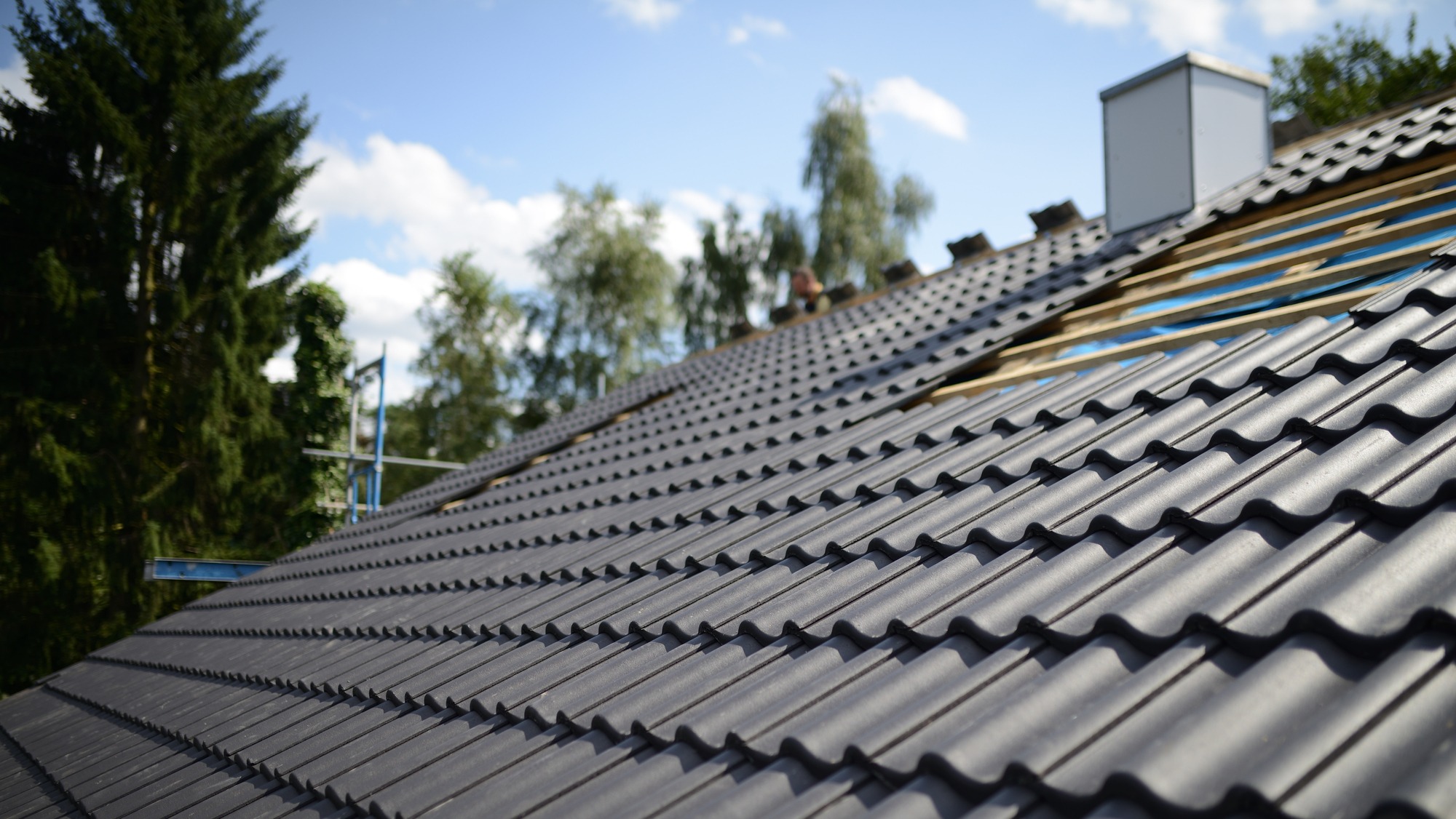 construction site roofing black tiles